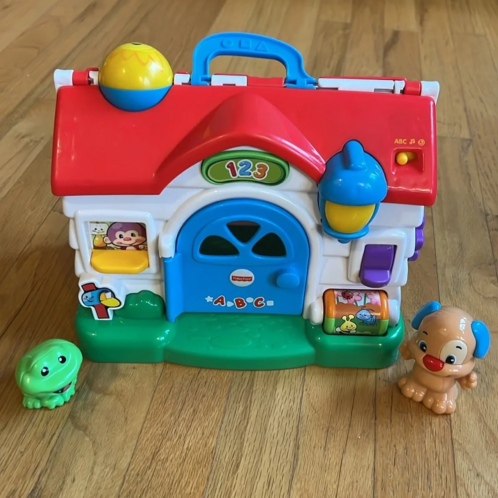 Fisher-Price Laugh & Learn Puppy’s Activity Home Educational Playset is - Picture 1 of 5